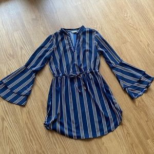 Navy and gold striped long sleeve dress with bell sleeves and tie waist